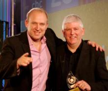 Friends and Heroes Marketing Director receives the award from Tim Vine